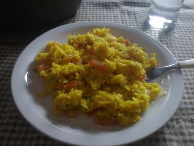 Risotto con tomate y perejil.