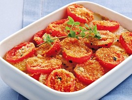 Tomates y patatas gratinados con orégano fresco